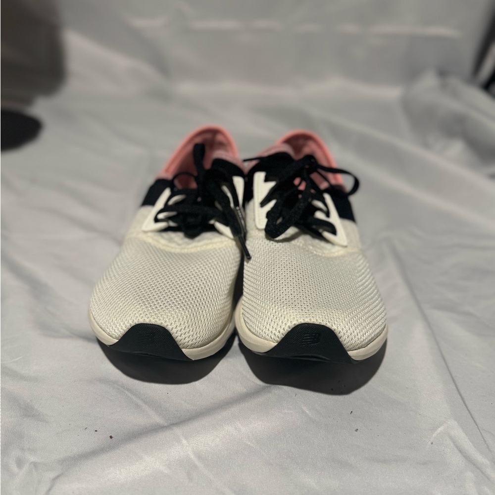 New Balance Women’s White, Black and Pink Knit Sneakers